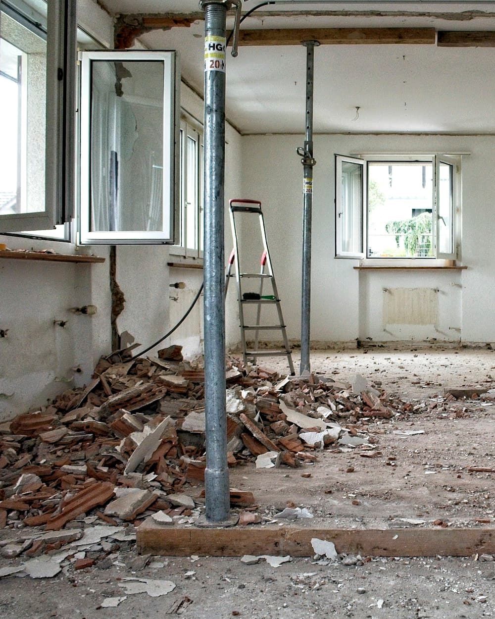 Room under restoration with temporary support poles